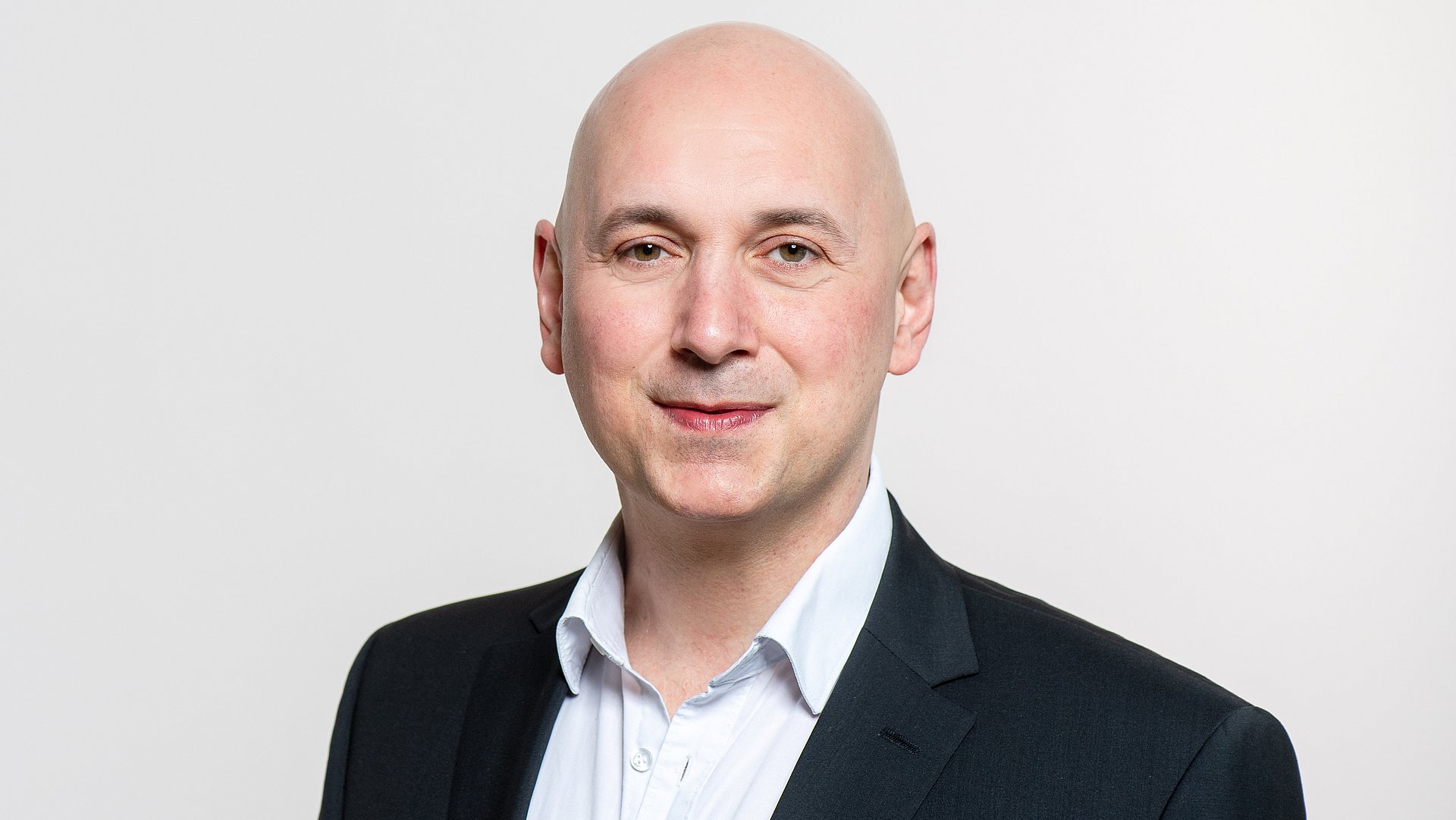 Portrait of Reid Alvarado, Director of Operations at Collier Engineering